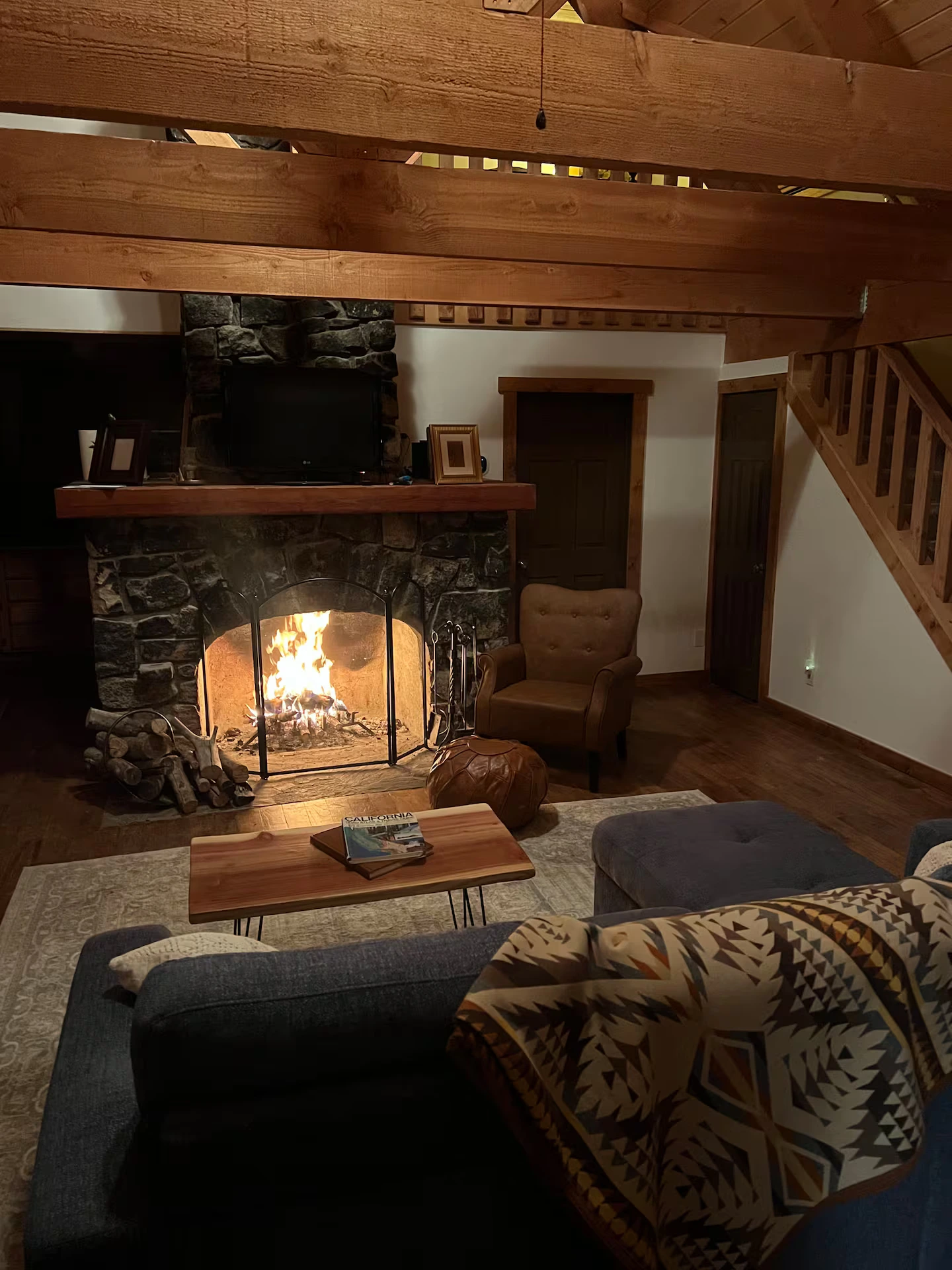 Mountain cabin with stone fireplace in Arrowbear Lake, California